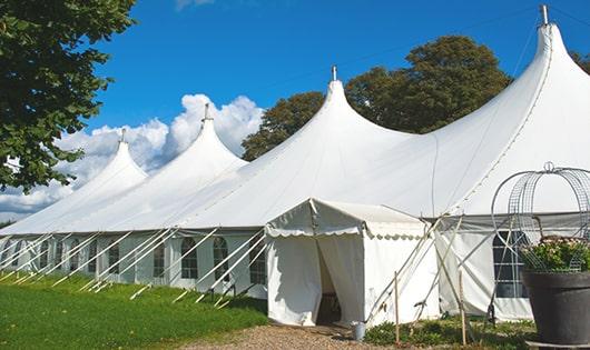 a group of luxury portable restrooms with individual stalls and running water in Bermuda Dunes